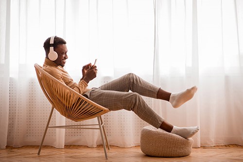 Person listening to music on their phone